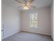 Bright bedroom with neutral carpet and ceiling fan at 966 Westmoreland Nw Cir, Atlanta, GA 30318