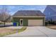 Detached two car garage with a driveway at 966 Westmoreland Nw Cir, Atlanta, GA 30318
