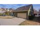 View of detached two car garage with a driveway at 966 Westmoreland Nw Cir, Atlanta, GA 30318