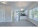 Bright kitchen features modern white cabinetry, granite countertops, and stainless steel appliances at 966 Westmoreland Nw Cir, Atlanta, GA 30318