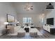 This staged living room offers a comfortable space with modern decor and lots of natural light at 966 Westmoreland Nw Cir, Atlanta, GA 30318