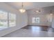 Open-concept living space features tile and dark wood flooring and lots of natural light at 966 Westmoreland Nw Cir, Atlanta, GA 30318