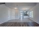 Bright open-concept space connects living and kitchen areas, featuring tile and wood flooring at 966 Westmoreland Nw Cir, Atlanta, GA 30318