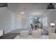 Spacious open concept living space with dining area, white walls, and tile and wood flooring at 966 Westmoreland Nw Cir, Atlanta, GA 30318
