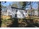 Beautiful two-story home boasts a spacious backyard with a fence and patio area at 513 S Malton Ct, Stone Mountain, GA 30083