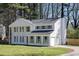 Elegant two-story home featuring a side entry garage and colonial architectural design at 513 S Malton Ct, Stone Mountain, GA 30083