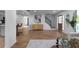 Open-concept living area with hardwood floors, modern decor and lots of space at 513 S Malton Ct, Stone Mountain, GA 30083