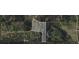 Aerial view highlighting property boundaries and layout, offering a sense of the land's potential at 75 Price Dr, Locust Grove, GA 30248