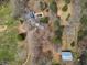 Rural property featuring a charming home, swimming pool, outbuilding and long driveway at 75 Price Dr, Locust Grove, GA 30248