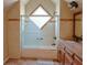 Cozy bathroom features tiled walls, shower and single sink vanity at 75 Price Dr, Locust Grove, GA 30248