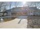 Back of house showing a sunroom and backyard pool at 75 Price Dr, Locust Grove, GA 30248