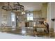 Eat-in kitchen with stainless appliances, a beautiful island, granite countertops, and ample lighting at 75 Price Dr, Locust Grove, GA 30248