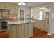 Eat-in kitchen features granite countertops, stainless steel appliances, and custom cabinetry at 75 Price Dr, Locust Grove, GA 30248
