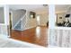 Open-concept living area featuring hardwood floors, stairs, and decorative wood-style panels at 75 Price Dr, Locust Grove, GA 30248