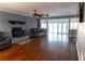 Spacious living room with hardwood floors and a stone fireplace at 75 Price Dr, Locust Grove, GA 30248