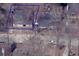 Aerial view of a property with a home and surrounding trees and vegetation, showing its overall layout at 1425 Rome Dr, Atlanta, GA 30314