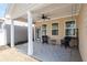 A covered back porch with two chairs and a small side table at 146 Point View Dr, Canton, GA 30114