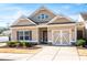 Inviting one-story home with a well-kept lawn, complemented by a convenient one-car garage and stylish curb appeal at 146 Point View Dr, Canton, GA 30114