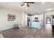 Open-concept living area featuring sleek floors connecting the kitchen, great for entertaining at 146 Point View Dr, Canton, GA 30114