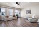 Comfortable living room with hardwood floors, neutral decor, and plenty of natural light at 146 Point View Dr, Canton, GA 30114