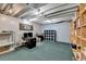 Unfinished basement area with shelving, ideal for storage or workshop space at 2030 Habersham Trce, Cumming, GA 30041