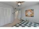 Bedroom with closet, desk, and artwork at 2030 Habersham Trce, Cumming, GA 30041