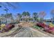 Charming clubhouse framed by colorful landscaping and a brick walkway at 2030 Habersham Trce, Cumming, GA 30041
