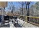 This spacious wooden deck provides ample room for outdoor dining, relaxation and entertaining with views of the private backyard at 2030 Habersham Trce, Cumming, GA 30041