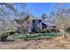 Charming two-story brick home with a well-manicured lawn and landscaping at 2030 Habersham Trce, Cumming, GA 30041