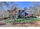 Charming brick home boasts lush greenery and a meticulously maintained lawn, creating curb appeal at 2030 Habersham Trce, Cumming, GA 30041