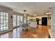 Eat-in kitchen area featuring a breakfast nook, hardwood floors, and natural light at 2030 Habersham Trce, Cumming, GA 30041