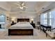 Main bedroom features a tray ceiling, lots of natural light, and an ensuite bathroom at 2030 Habersham Trce, Cumming, GA 30041
