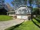 Charming home with a two-car garage and manicured front lawn at 3210 Ebenezer Rd, Marietta, GA 30066