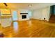 Inviting living room with hardwood floors, fireplace, and stair access at 3210 Ebenezer Rd, Marietta, GA 30066