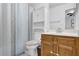 Bathroom featuring a vanity, mirror, cabinets, and shower at 1923 Ivy Glen Se Dr, Smyrna, GA 30082