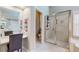 Bathroom featuring a makeup vanity and a glass shower at 5189 Brooke Farm Dr, Atlanta, GA 30338