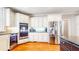 Stainless steel appliances including oven, microwave, and refrigerator compliment this kitchen at 5189 Brooke Farm Dr, Atlanta, GA 30338