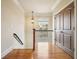 Upstairs hallway with hardwood floors and staircase at 1211 Thornwell Ne Dr, Brookhaven, GA 30319