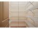 Walk-in pantry with multiple tiers of wire shelving, ensuring ample storage at 1211 Thornwell Ne Dr, Brookhaven, GA 30319