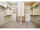 Large walk-in closet with shelving and storage solutions at 1211 Thornwell Ne Dr, Brookhaven, GA 30319