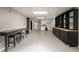 Spacious finished basement with a bar area, custom cabinets, and kitchenette at 2870 Carla Nw Dr, Kennesaw, GA 30144