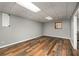 Finished basement area with hardwood floors, windows, and natural light at 2870 Carla Nw Dr, Kennesaw, GA 30144