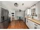 Modern kitchen with stainless steel appliances and white cabinets at 2870 Carla Nw Dr, Kennesaw, GA 30144