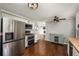 Modern kitchen with stainless steel appliances, white cabinets and breakfast area at 2870 Carla Nw Dr, Kennesaw, GA 30144