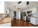 Updated kitchen with white cabinets, stainless appliances, and wooden countertops at 2870 Carla Nw Dr, Kennesaw, GA 30144