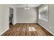 Dining area with wood-look flooring, bright light, and neutral color scheme at 2911 Botany Dr, Jonesboro, GA 30236