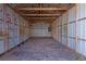Interior of the metal and wood frame shed revealing ample storage and utility possibilities at 2911 Botany Dr, Jonesboro, GA 30236