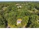 Lush greenery surrounds this home, with a distant view of the Atlanta skyline at 1893 Burning Tree Dr, Decatur, GA 30032