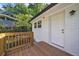 Back deck that includes a well-maintained backyard and privacy fence at 1893 Burning Tree Dr, Decatur, GA 30032