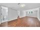 A spacious renovated basement featuring wood floors, access to a bathroom and bright lighting at 1893 Burning Tree Dr, Decatur, GA 30032
